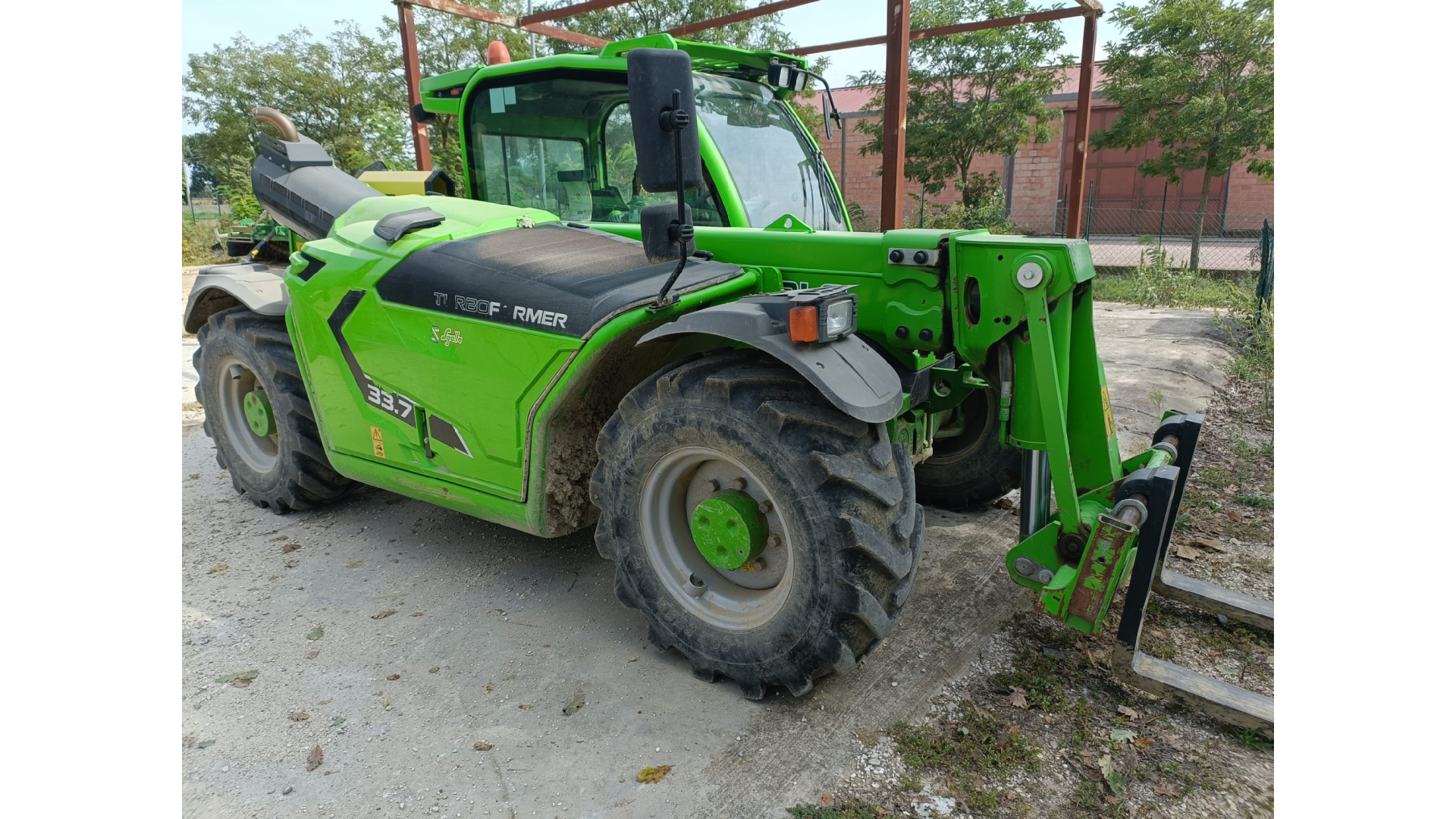 Sollevatore telescopico Merlo TF 33.7 usato