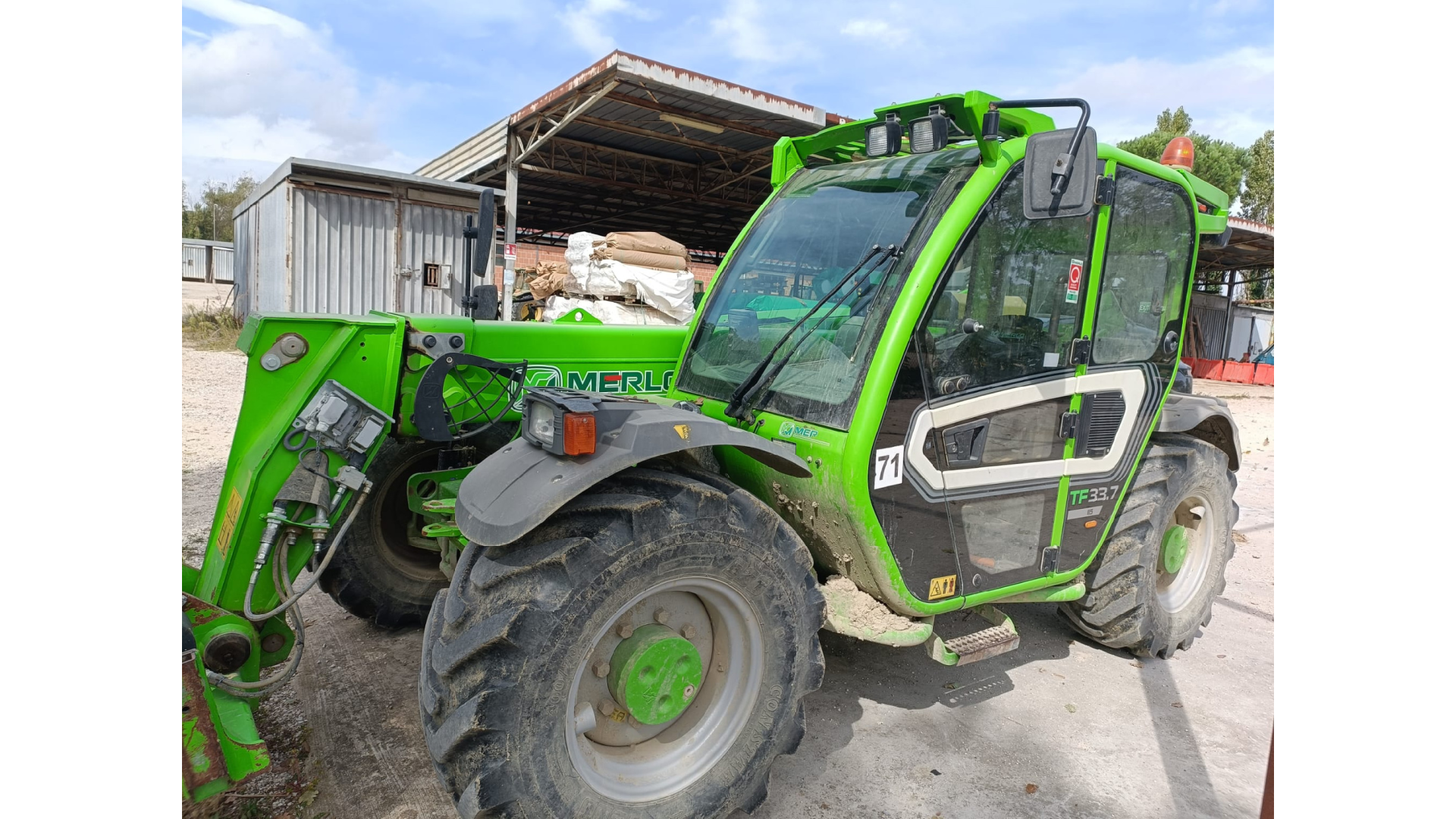 Sollevatore telescopico Merlo TF 33.7 usato