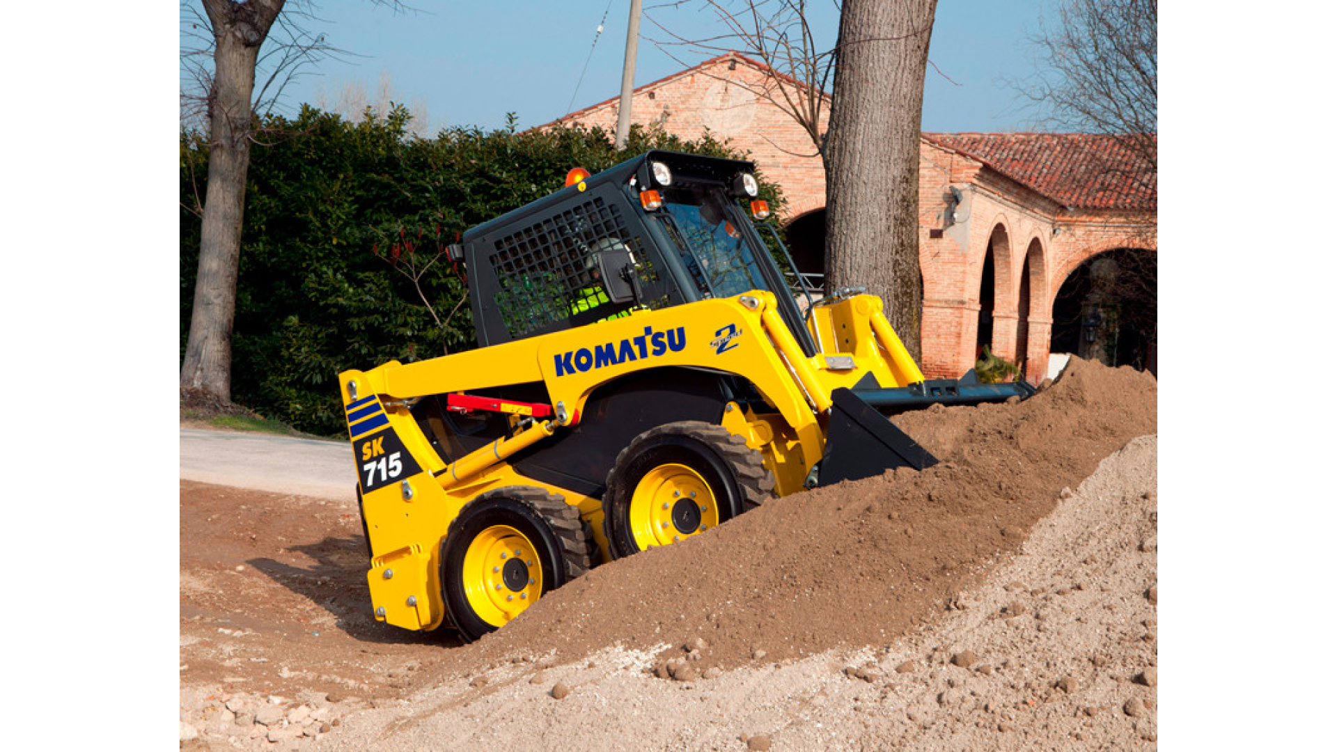 Minipala gommata KOMATSU SK715-8